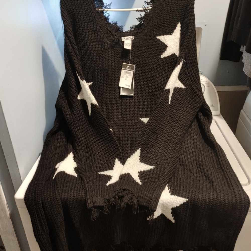 Rue 21 black with white stars sweater. Size XL